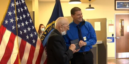 Veteran receives high school diploma after 80 years